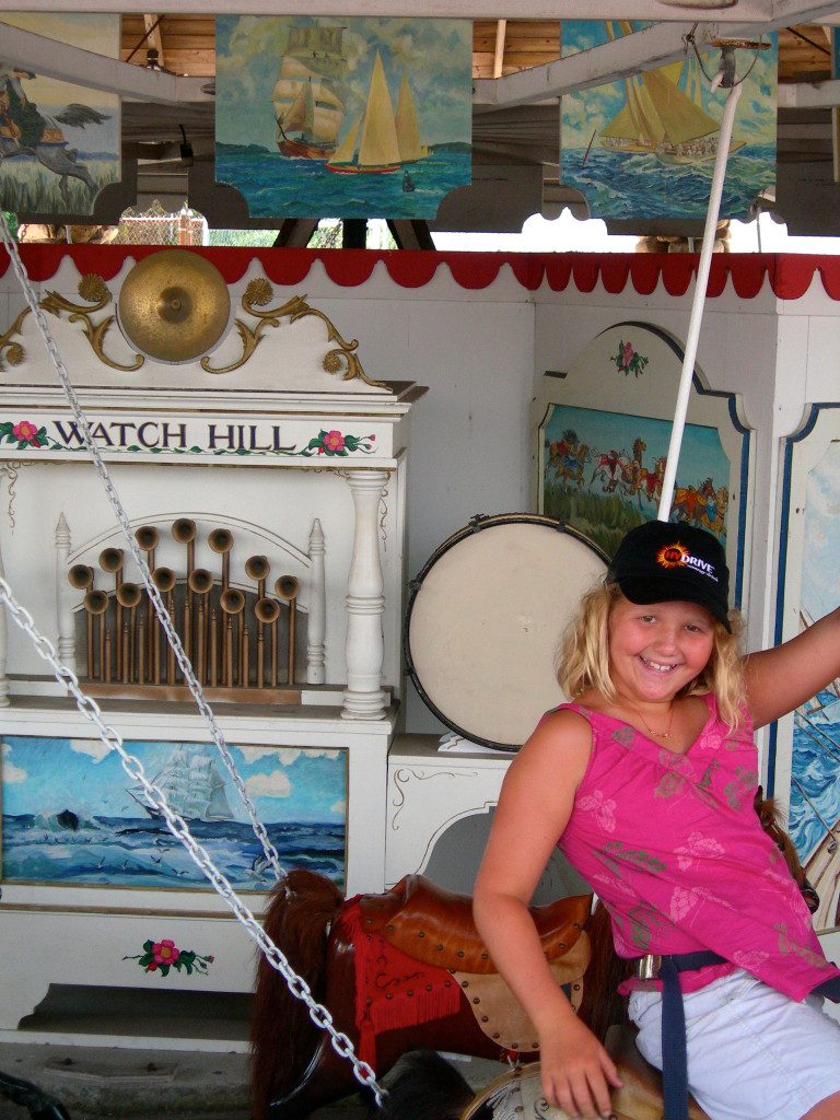Grace, age 10, on the Merry-Go-Round